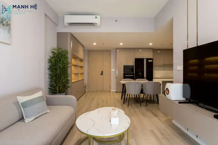 Nội Thất Phòng Khách Chung Cư Với Bàn Trà Tròn Đôi Cùng Bộ Sofa Gam Màu Xám Nhẹ Nhàng