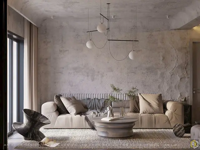 Một Không Gian Phòng Khách Mang Đậm Dấu Ấn Nghệ Thuật Với Bức Tường Thô Mộc Làm Nền Cho Bộ Sofa Êm Ái Và Chiếc Bàn Trà Độc Đáo
