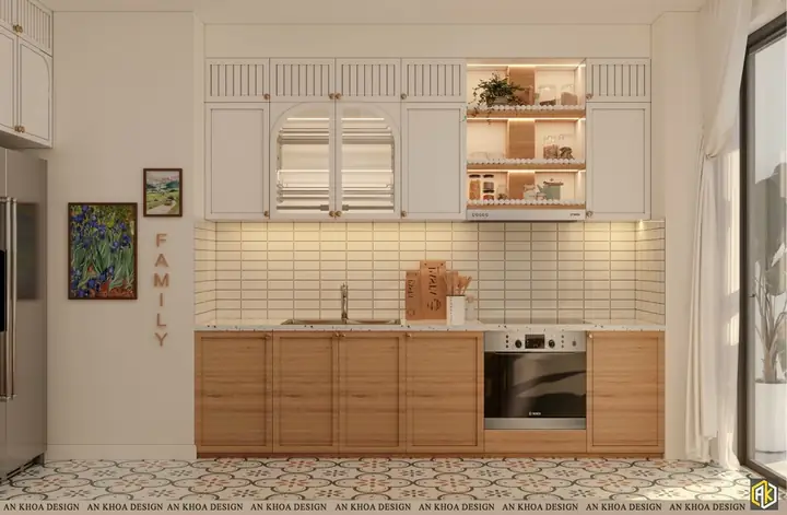 Gian Bếp Thanh Thoát Với Sự Kết Hợp Dịu Nhẹ Giữa Sắc Trắng Và Gỗ Tự Nhiên, Nổi Bật Bởi Ánh Sáng Chan Hòa Và Cách Bày Trí Tinh Tế, Gợi Cảm Giác Ấm Áp Và Đầy Yêu Thương