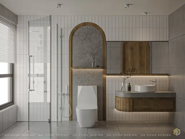 Bồn Rửa Mặt Tròn Trên Mặt Đá Xám Cùng Chiếc Gương Lớn Có Khung Gỗ Cong Tạo Nên Một Không Gian Hài Hòa Và Tinh Tế