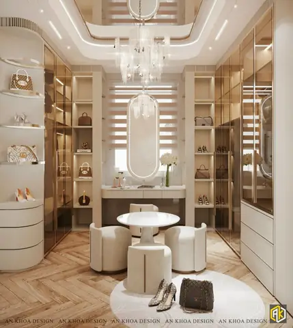 Một Phòng Thay Đồ Xa Hoa Và Lộng Lẫy Với Hệ Tủ Kính Trưng Bày Bộ Sưu Tập Túi Xách Và Giày Dép Thời Trang, Được Chiếu Sáng Bởi Chiếc Đèn Chùm Pha Lê Rực Rỡ
