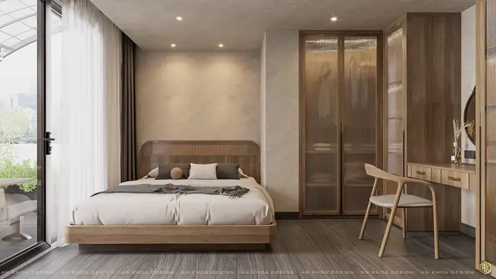 Một Phòng Ngủ Mang Đậm Phong Cách Wabi Sabi Với Chiếc Giường Gỗ Mộc Mạc Và Tủ Quần Áo Cánh Kính Mờ, Tạo Cảm Giác Tĩnh Lặng Và Gần Gũi Với Thiên Nhiên