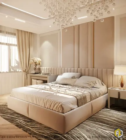 Phòng Ngủ Trang Nhã Và Ấm Áp Với Chiếc Giường Lớn Êm Ái Đặt Trên Tấm Thảm Họa Tiết Trừu Tượng, Tựa Vào Bức Tường Ốp Nệm Mềm Mại